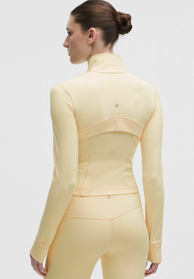 lululemon Butter Cream Cropped Jacket and High-Rise Crop